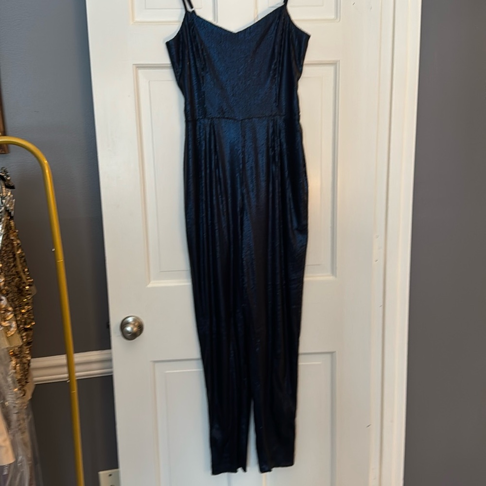 Rules of Etiquette navy sequin jumpsuit
Size medium